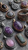 Colorful gemstone jewelry arranged artistically on a textured surface showcasing unique designs and materials in a warm light photo