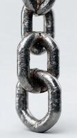 Heavy metallic chain links on a neutral background, highlighting durability and strength in close-up detail photo
