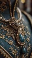 Intricately designed vintage jewelry featuring ornate patterns and precious stones on a richly embroidered garment photo