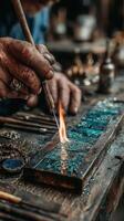 Skilled artisan creates intricate designs using flame and metal techniques in a workshop setting photo