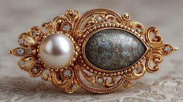 Elegant vintage brooch with pearl and intricate design set on textured background photo