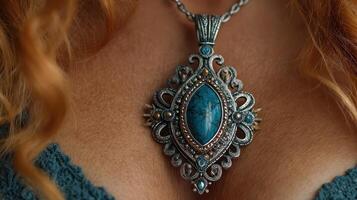 Beautiful turquoise pendant showcased against a backdrop of intricate silver detailing and warm, flowing hair photo