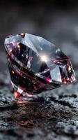 Stunning crystal clear diamond gem sparkling with vibrant colors on a dark textured surface photo