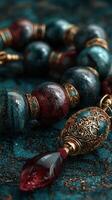 Intricate decorative beads with elegant designs displayed on textured surface in soft lighting photo