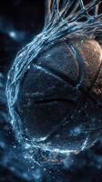 Basketball splashing through the hoop with vibrant energy and dynamic water effects during a night game photo