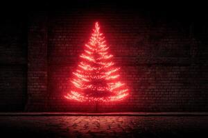 Bright red illuminated Christmas tree stands against dark brick wall in urban setting photo