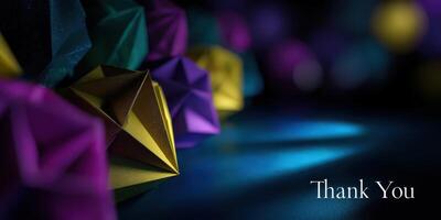 Colorful geometric shapes create a vibrant display with a thank you message in an artistic arrangement photo