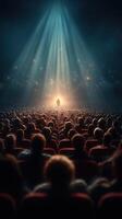 Audience captivated by a speaker under dramatic lighting in a theater filled with anticipation photo