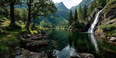 Majestic waterfall cascades into a serene lake surrounded by lush greenery and towering mountains in the afternoon sunlight photo