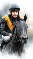 Jockey riding a focused black horse during an early morning training session at a racetrack photo