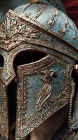 Intricate blue and gold ancient helmet displayed in a museum during a cultural exhibition photo