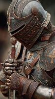 Intricate medieval knight armor displayed in a moment of reflection during a historical reenactment event photo