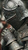 Elaborate medieval armor showcasing intricate designs on a knight during a historical reenactment in a castle courtyard photo