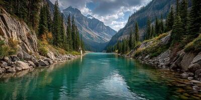 Serene lake reflecting mountains and pine trees in a peaceful valley during early morning photo
