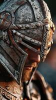 Detailed close-up of a medieval warrior wearing an ornate helmet during a sunset photo