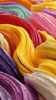 Colorful swirls of paint showcase vibrant hues in an artistic display photo