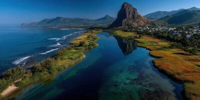 Breathtaking coastal view showcasing a curved river and vibrant greenery under clear blue skies photo