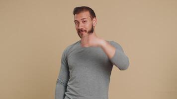 Man showing inviting gesture with hands ask to join beckoning to coming, gesturing hello goodbye video