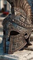Detailed ancient Roman helmet displayed on a stone pedestal highlighting its ornate design and historical significance in a museum setting photo
