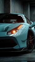 Stylish turquoise sports car with sleek design and glowing headlights in a dimly lit garage setting photo