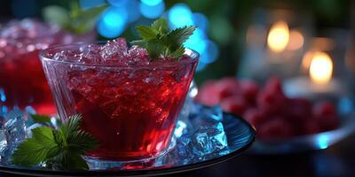 Refreshing berry cocktail adorned with fresh mint leaves served in a glass surrounded by ice photo