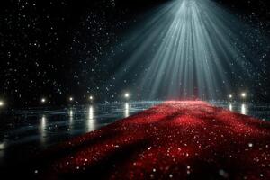 Bright stage illuminated by beams of light with a shimmering red carpet and sparkling particles in a dark venue during a special event photo