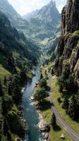 Majestic mountain valley with winding river and lush greenery during bright daylight hours photo