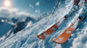 Skiing downhill on a snowy mountain slope during a sunny winter day with splashes of snow and dynamic motion photo