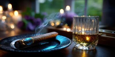 Enjoying a cigar and whiskey in a cozy setting with soft candlelight and floral accents in the evening photo