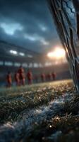 Players practice for an important soccer match on a chilly evening in a stadium under dramatic lighting photo