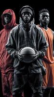 Three basketball players in urban sportswear posed dramatically against a dark background, showcasing their skills and dedication photo