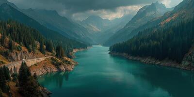 Scenic view of a tranquil mountain lake surrounded by dense forests and towering peaks in late afternoon light photo