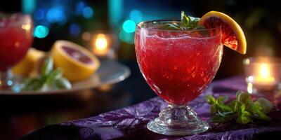 Refreshing cocktail garnished with citrus and herbs served at a stylish bar during the night photo
