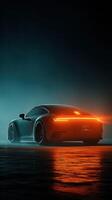 Sleek car with glowing rear lights parked on a reflective surface in a dark, atmospheric environment photo