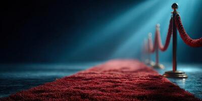 Elegant red carpet leading to a spotlight in a darkened venue during an upscale event in the evening photo
