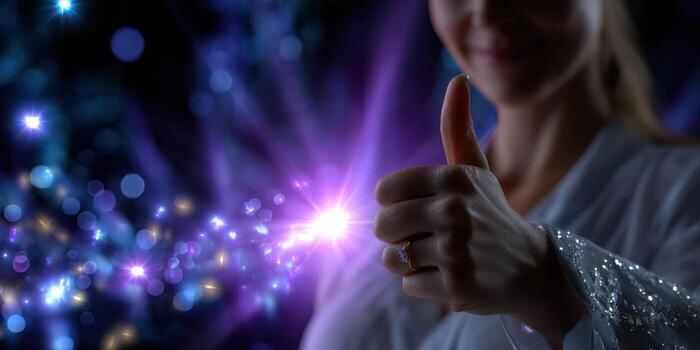 Woman with sparkling lights giving a thumbs up in a creative backdrop during an evening event photo