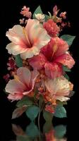 Vibrant arrangement of hibiscus and floral elements in lush colors set against a dark background photo