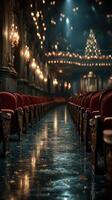 Elegant theater interior showcases empty red velvet seats with beautiful lighting and festive decorations during evening hours photo