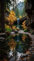 Beautiful waterfall surrounded by autumn foliage in a serene forest setting photo