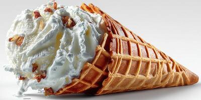 Creamy vanilla ice cream topped with whipped cream in a crispy waffle cone during a sunny day photo