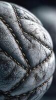 Basketball with worn leather texture showcases craftsmanship and history, emphasizing age and use during training sessions photo