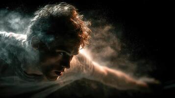 Man in motion creating dynamic silhouette with dust particles at night photo