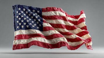 American flag displayed in a dynamic wave, showcasing its colors and pattern, created with a textured design, against a neutral backdrop photo