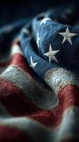 American flag draped with intricate folds showcasing stars and stripes in natural lighting photo