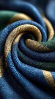 Colorful fabric swirl showcases elegant textile design with rich tones in a close-up view photo