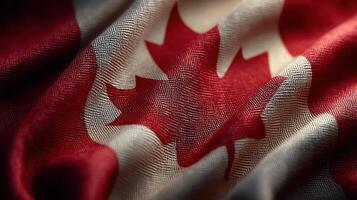 Canada flag gracefully waving, showcasing rich colors and intricate textures under gentle light in a calm setting photo