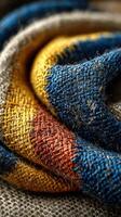 Beautifully woven fabric showcases intricate colors and textures in a close-up view of textile artistry photo