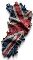Tattered flag fabric with faded colors and frayed edges displayed on a neutral background, showcasing texture and history photo