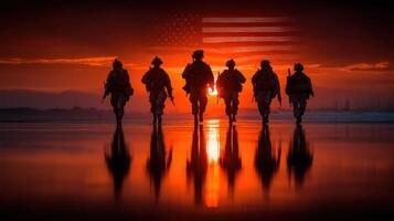 Soldiers march towards the sunset reflecting on calm waters with an American flag in the background photo