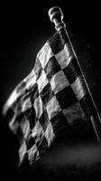 Checkered flag in motion captured with dramatic lighting during a racing event celebration photo